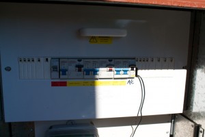 Clamp wire routed behind the fuse box